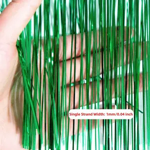 Macro detail of 1mm green metallic foil fringe curtain strand for party backdrop decoration