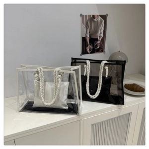 Detailed view of the clear PVC tote bag with cotton rope handle and inner pouch insert