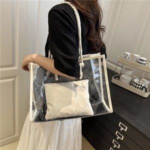 Minimalist transparent PVC tote bag with white hemp rope handles and inner canvas pouch