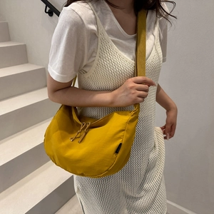 Modern bright yellow half-moon canvas crossbody bag for women's daily casual summer style