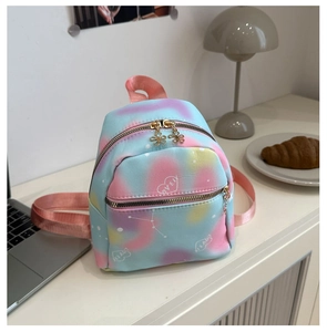 Detail of macaron tie-dye mini backpack with heart print and gold flower zipper pulls