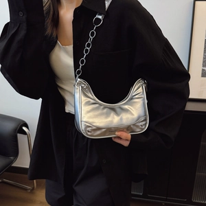 Metallic silver crescent underarm bag with metal chain strap and rivet details