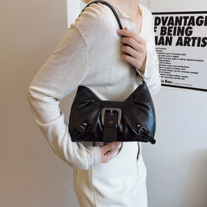 Retro black oversized pleated hobo bag with metallic buckles for chic commuter fashion