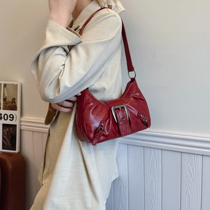 Vintage red large capacity shoulder bag in distressed leather with metal buckle details