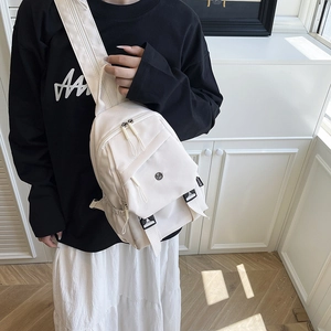 Versatile white nylon crossbody chest bag for women featuring multiple zipper pockets