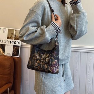 Vintage floral jacquard crescent handbag with elegant Chinese-style print in black