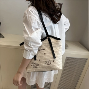 Large capacity woven straw tote bag with black leather straps and cartoon cat embroidery