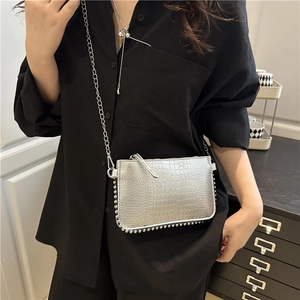 Silver crocodile embossed mini square bag with metal chain strap and studded detail