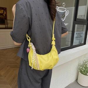 Chic yellow crescent moon handbag with pleated PU leather and woven cord heart charm