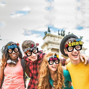Close-up of inspirational graduation eyewear props featuring colorful Chinese characters