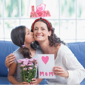 Detail of Mother's Day headband with 'I LOVE MOM' lettering and pink heart accents