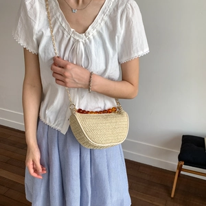 Summer woven beige half-moon saddle bag with amber beads and metal chain strap