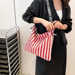 Fashionable red and white striped canvas tote bag with geometric strap for women