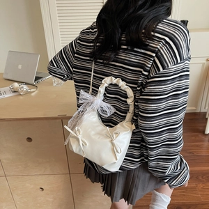 Aesthetic white lace bow handbag in matte PU leather with pleated ruffle handle detail