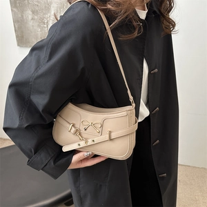 Sac à bandoulière minimaliste en cuir PU beige avec nœud décoratif et détails dorés