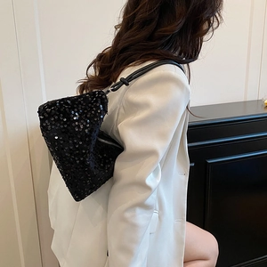Chic black sequined pillow shoulder bag for women with minimalist aesthetic style