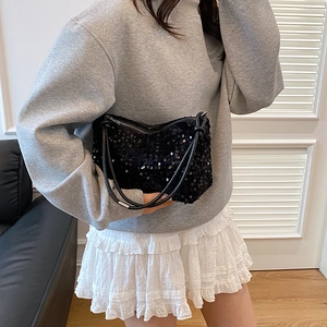 Fashionable black sequin shoulder bag for women with sleek leather straps and metal zipper