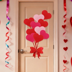 Détail de stickers muraux cœurs avec nœud rouge pour décoration de Saint-Valentin