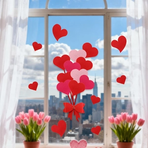 Détail de stickers de fenêtre en feutre en forme de cœur avec nœud pour la Saint-Valentin