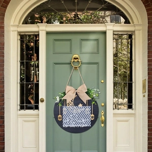 Ramadan Mubarak wooden hanging door sign with moon, stars, and linen bow decoration