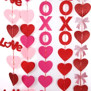 Detail of Valentine's Day hanging decorations with glitter red hearts and Love letters