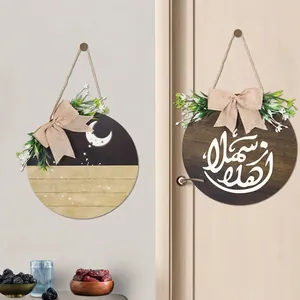 Ramadan wooden door plaques with moon patterns and decorative bows for Eid party decor