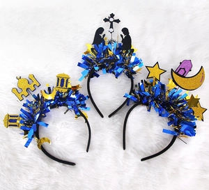 Detailed view of Eid and Christmas tinsel headbands with glitter stars and silhouettes