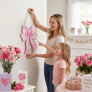 Pink bow wooden wall plaque Mother's Day MOM decor with jute rope in cozy home setting