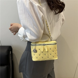 Quilted yellow box crossbody bag with silver chain and rose charm for fashion women