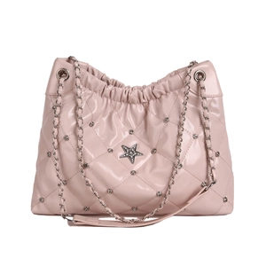 Pink quilted tote bag with star rhinestone detail and metal chain strap for women