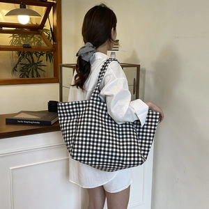 Minimalist black and white checkerboard canvas tote bag with matching hair scrunchie