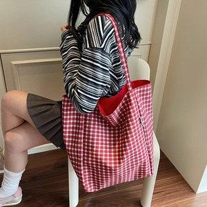 Chic red and white plaid canvas tote bag for women showing spacious interior and trendy style