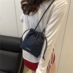 2025 Summer dark blue denim drawstring bucket bag with adjustable crossbody strap