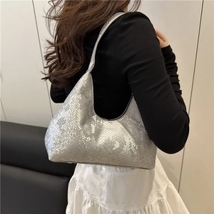 Silver snakeskin texture hobo shoulder bag with a modern crescent moon silhouette