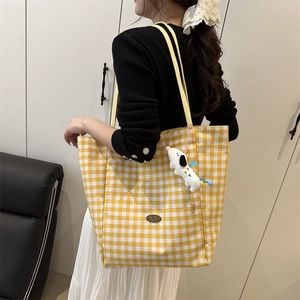 Women's yellow plaid canvas tote bag with plush dog charm for summer casual commuting