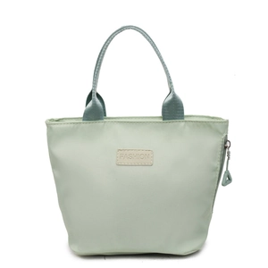 Chic mint green nylon tote bag with fashion leather patch and durable handles