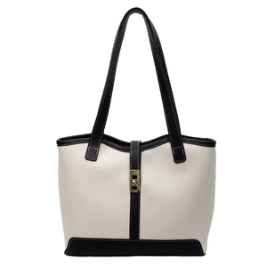 Chic cream and black contrast tote bag with gold lock buckle and leather handles
