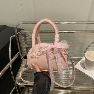 Chic pink mini handbag with 3D bow relief and elegant lace ribbon decoration