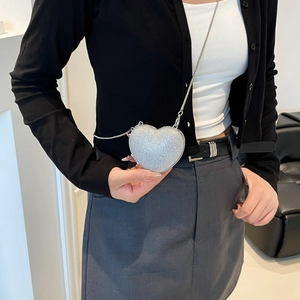 Silver heart-shaped glitter evening bag with fine metal chain strap for women