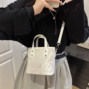 Elegant white geometric jacquard square crossbody bag for women with silver hardware