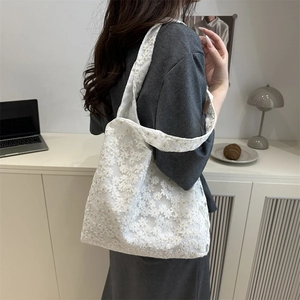 Elegant white lace hollow embroidery tote bag for women showing stylish large capacity