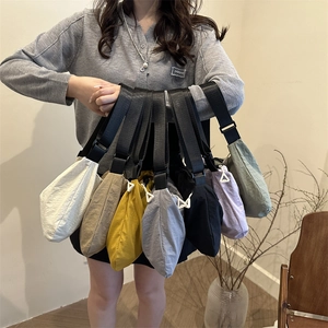 Minimalist canvas crossbody chest bags with adjustable straps in various colors for women