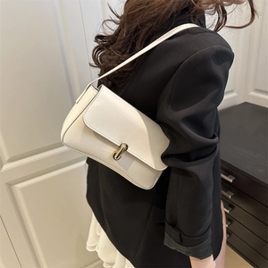 Minimalist white leather shoulder bag for women with elegant gold U-shaped metal buckle