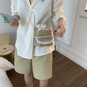 Colorful woven bucket bag with pearl handle and metal chain strap for summer fashion
