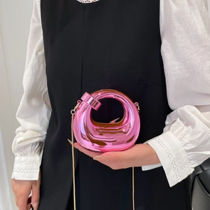 Chic pink metallic hollow circular crescent handbag with gold chain strap for party evening