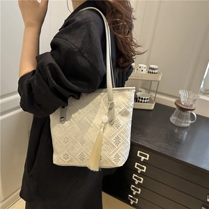 Large Chinese style embroidered tote bag with geometric pattern and tassel detail