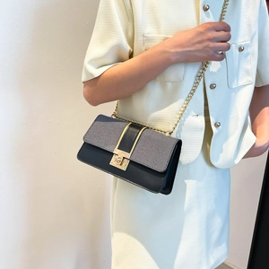 Minimalist rectangular crossbody bag with bicolor patchwork and gold chain strap