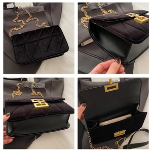 Detailed views of black velvet quilted crossbody bag with gold lock and chain strap