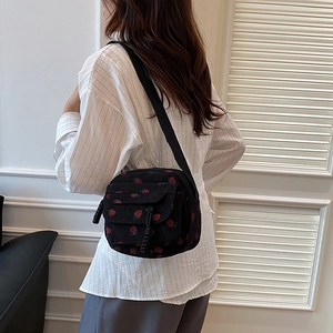 Vintage black corduroy crossbody bag with strawberry print and adjustable wide strap