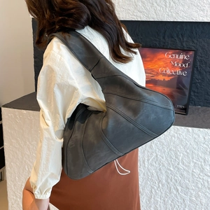 Minimalist large capacity dark grey shoulder bag with matte texture and diagonal stitching